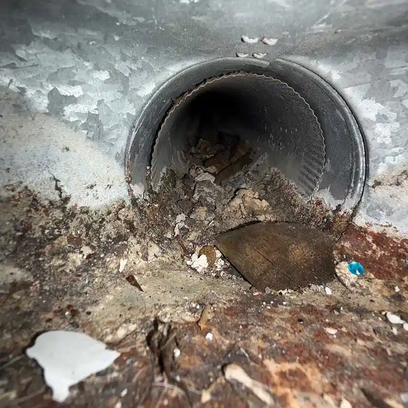 Dirty air duct before professional cleaning